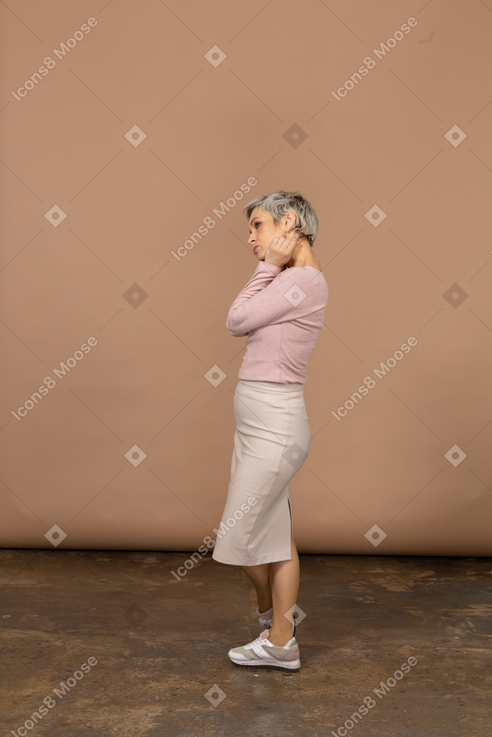 Side view of an upset woman in casual clothes