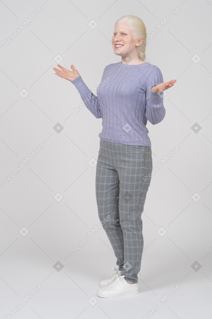 Happy young woman spreading arms