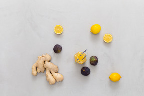 Ginger, lemons, figs and dried twig