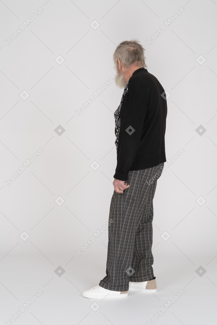Side view of an elderly man looking away