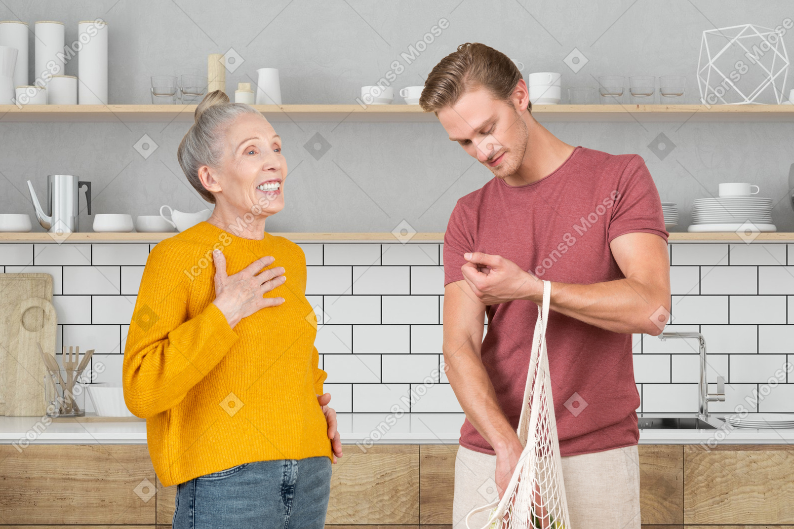 A man is taking groceries out of bag next to a laughing older woman