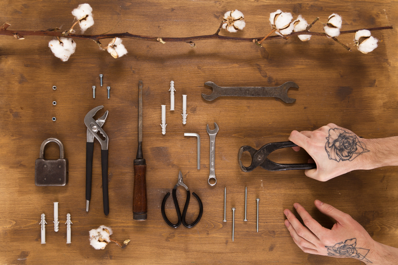 Common household tools on wooden background