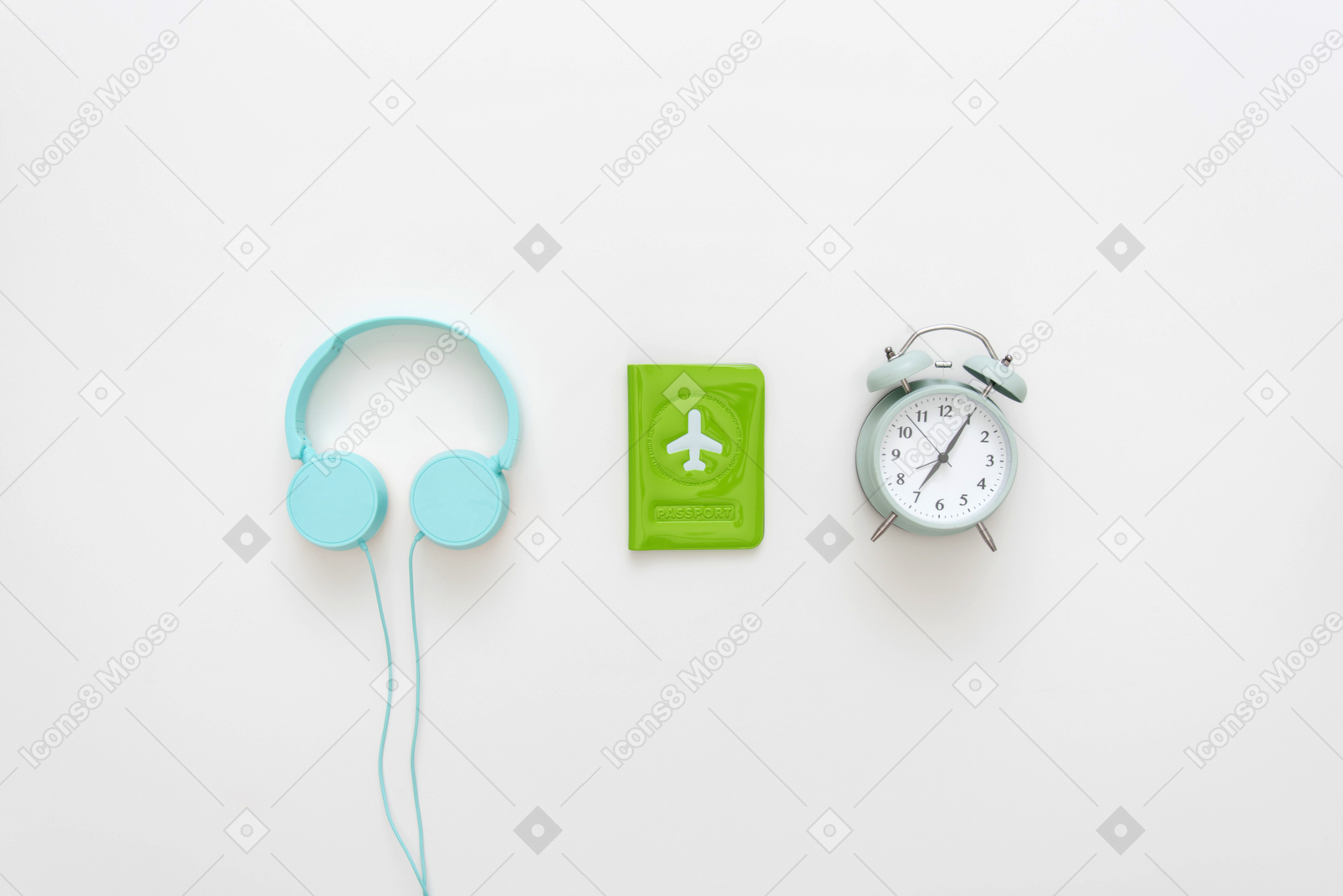 Blue headphones, passport cover and alarm clock