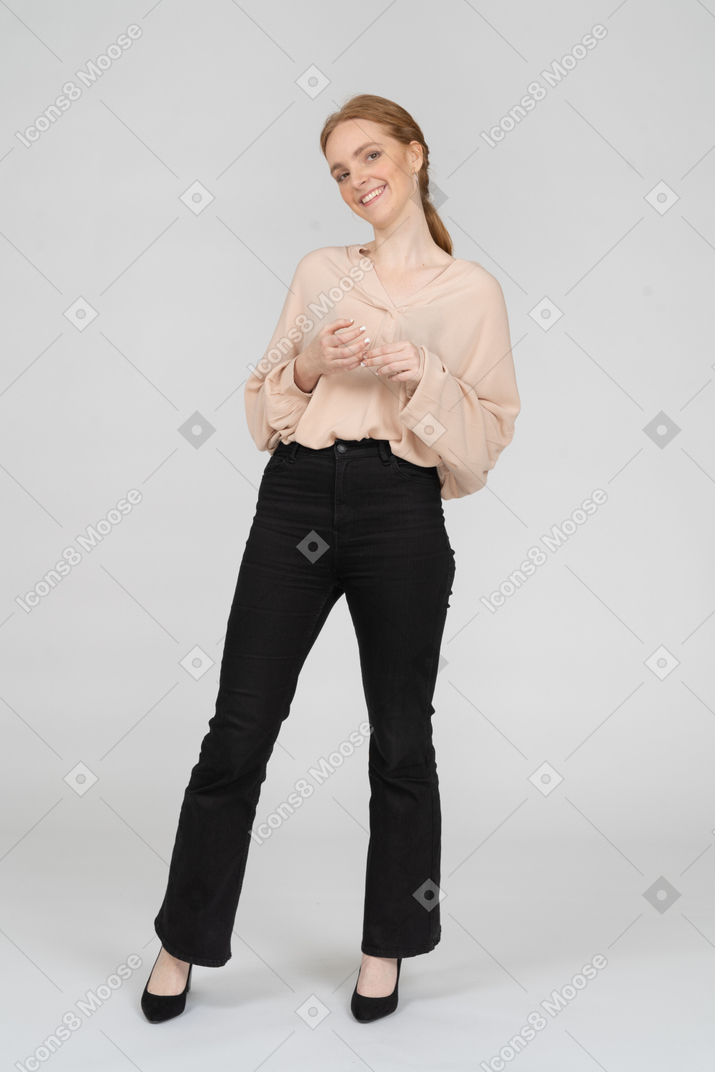 Woman in beautiful blouse standing