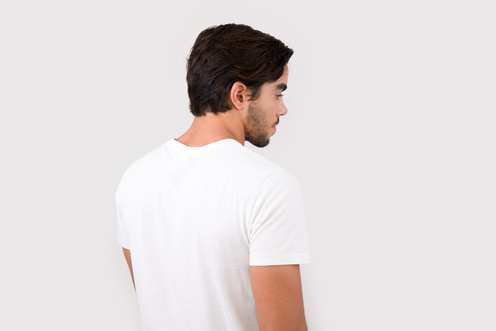 Young handsome man in white t-shirt