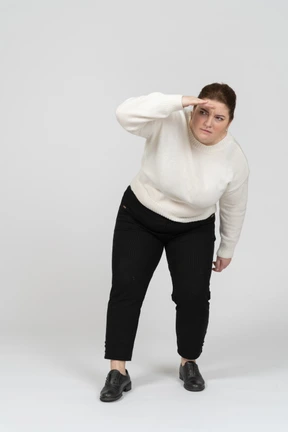 Front view of plus size woman looking for someone