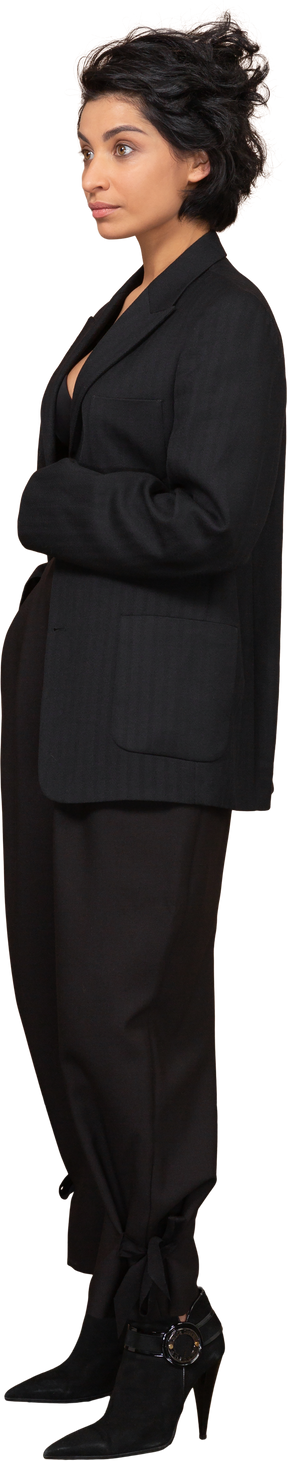 Three-quarter view of a businesswoman in a black suit
