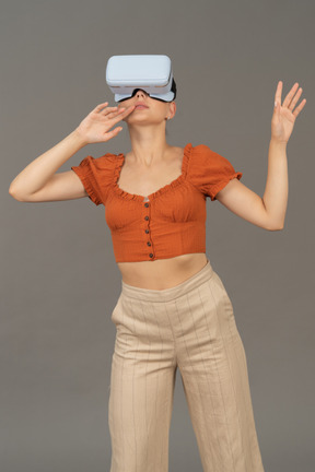 Front view of young woman in vr headset