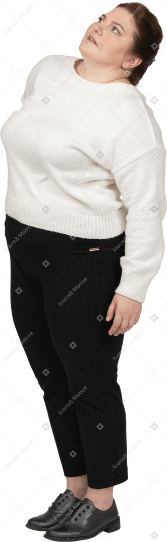 Plump woman in casual clothes suffering from pain in lower back