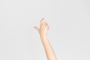 Female hand showing kind of scary gesture