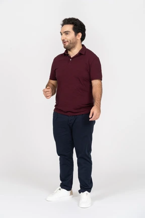 A smiling young man wearing casual clothes