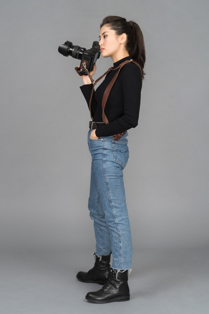Female photographer awaiting to start shooting