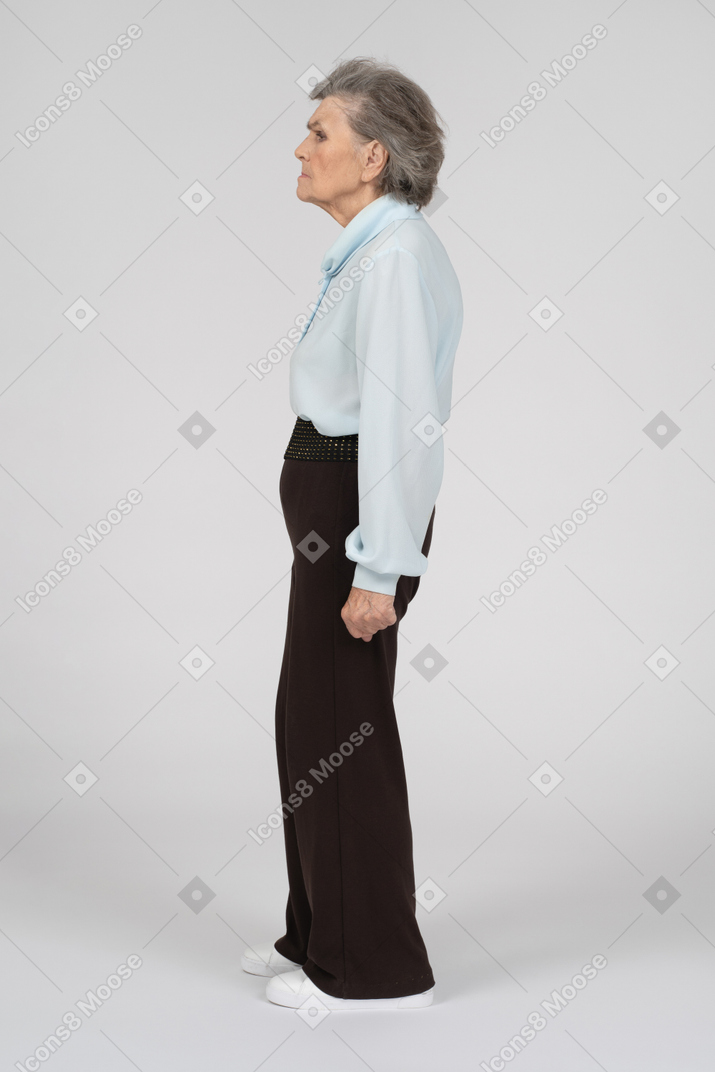 Side view of an old woman looking bitter
