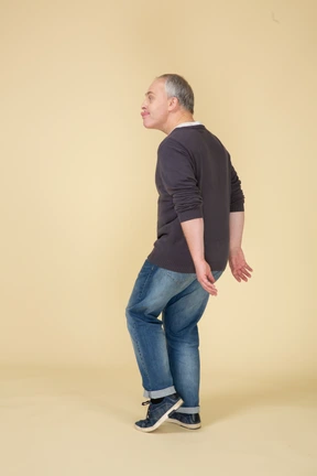 Man in casual clothes dancing