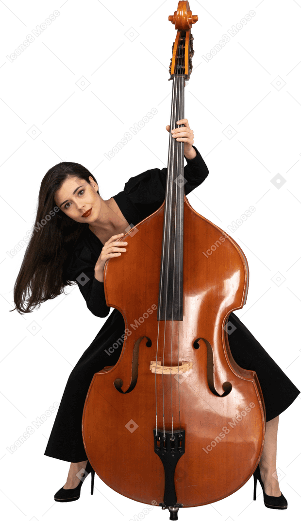Front view of a young lady squatting behind her double-bass