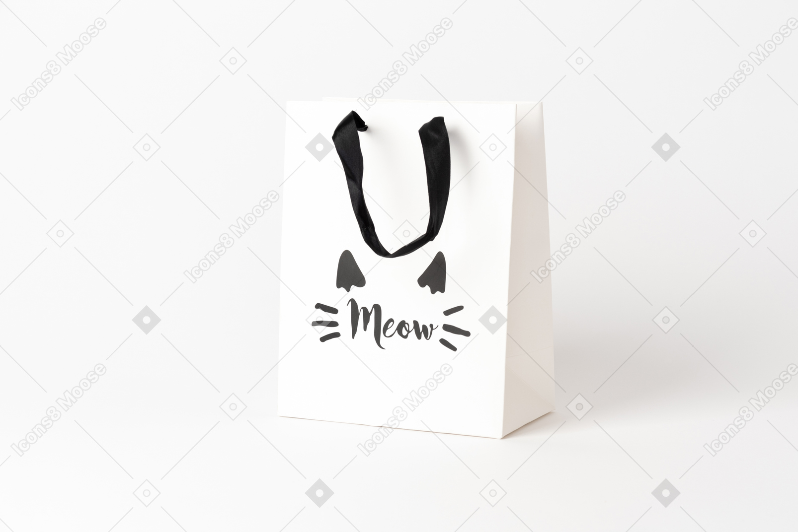 Adorable petit sac cadeau en papier avec des mains noires