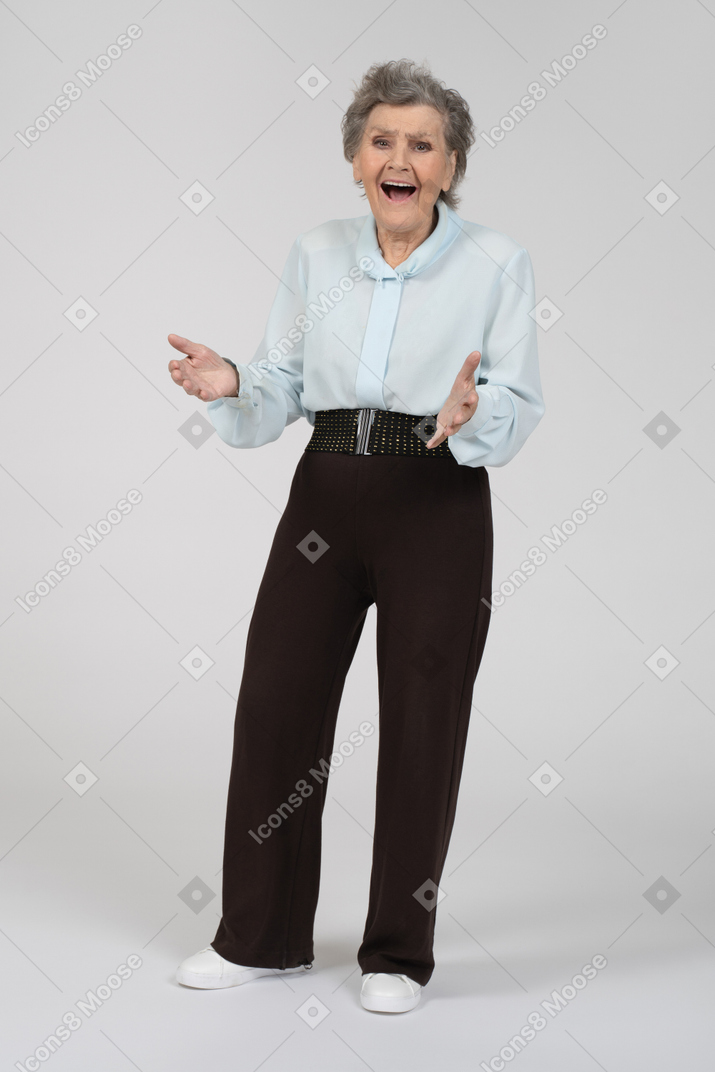 Front view of an excited old woman