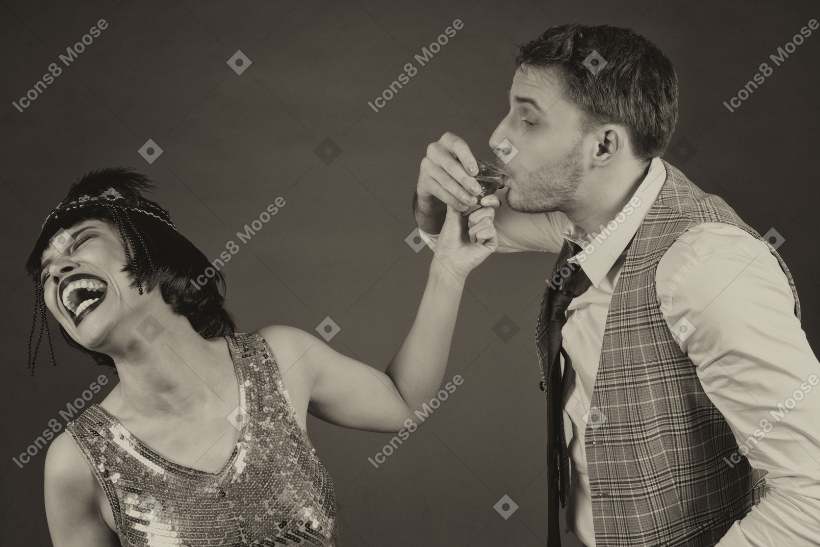 Flapper laughing out loud while her boyfriend drinking a shot