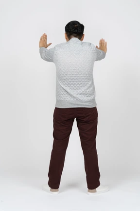 Man in casual clothes standing