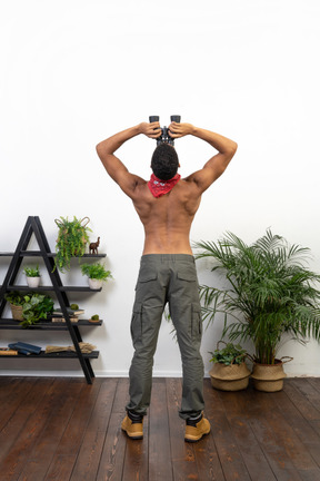 Good looking young man with binoculars