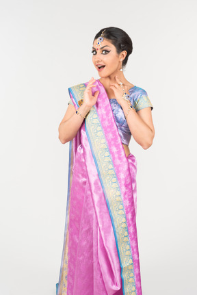 Young indian woman in purple sari