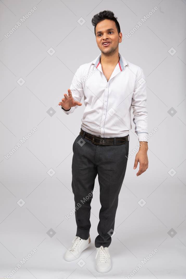 Man in white shirt standing