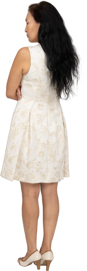 Woman in beautiful dress standing