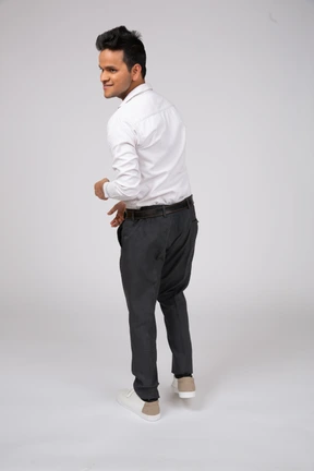 Man in white shirt standing
