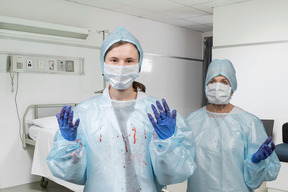 Surgeons in scrubs in an operating room