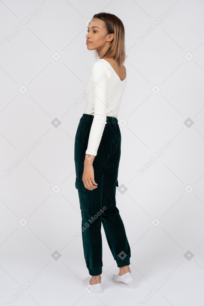 Woman in casual clothes standing