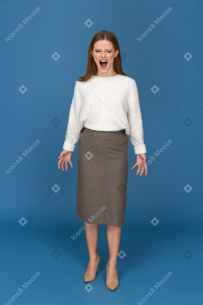 Young businesswoman raging