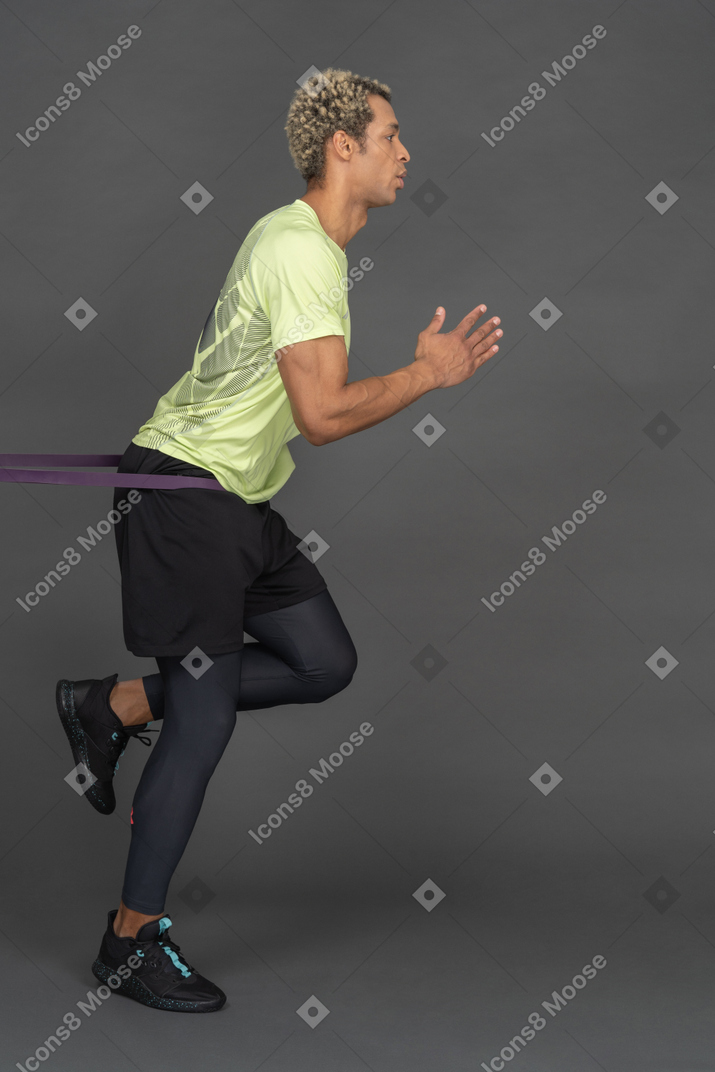 Man using resistance band for exercise