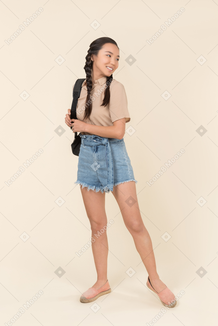 Joyful young woman in casual clothes