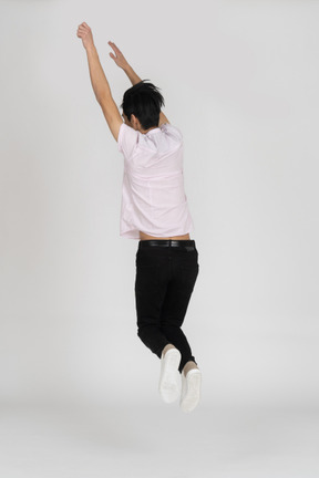 Man in casual clothes jumping