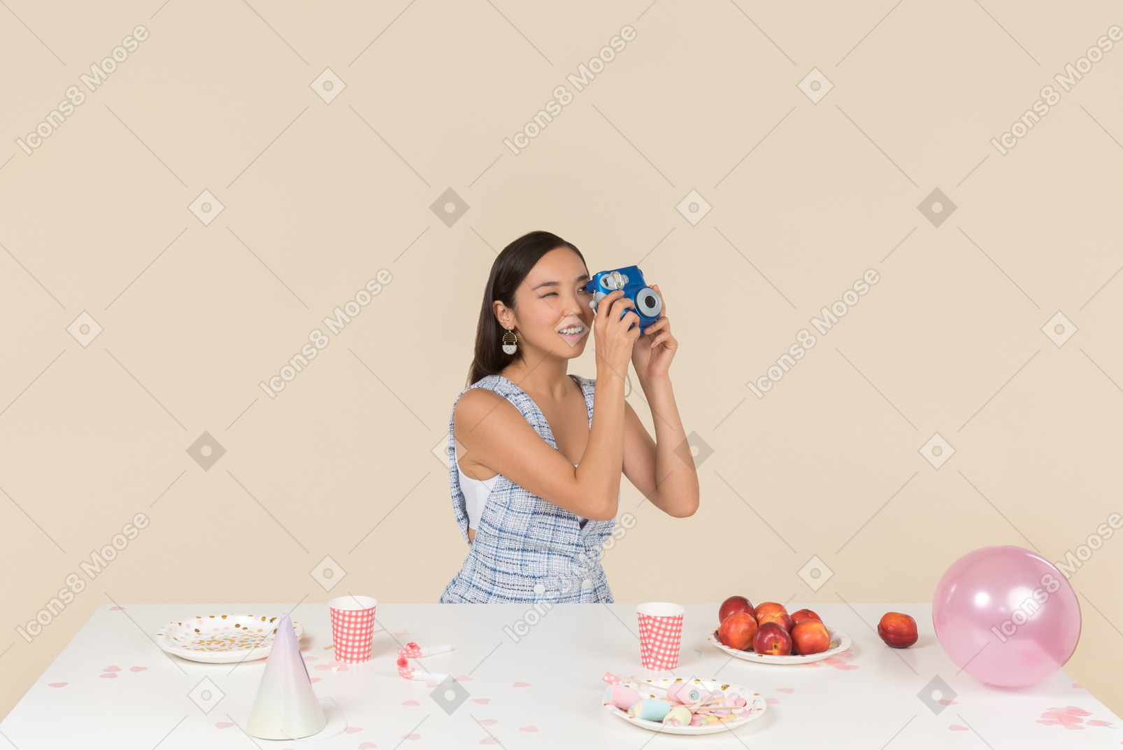 Young asian woman celebrating birthday and making a photo