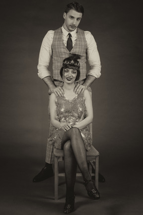 Full length black and white portrait of a retro-styled family