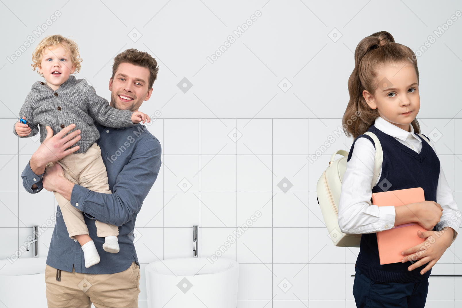 Young man holding his son and his daughter standing next to him