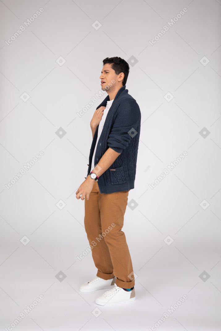 Disappointed man in blue cardigan