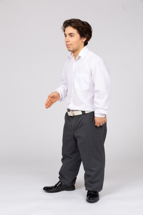 Young man in white shirt gesturing