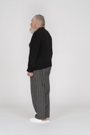 Back view of old man standing