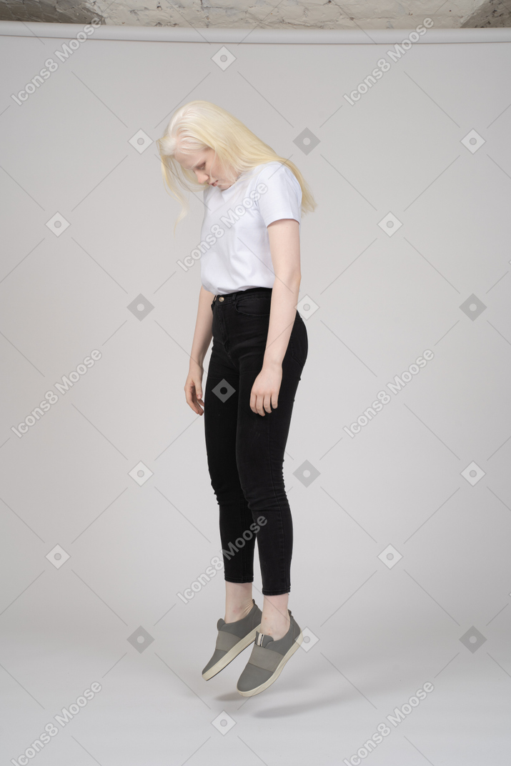 Girl levitating with head down
