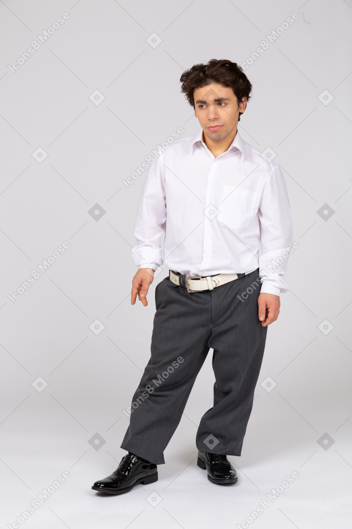 Office worker in business casual clothes looking aside