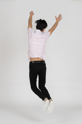 Man in casual clothes jumping