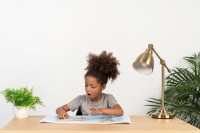 Cute girl doing homework