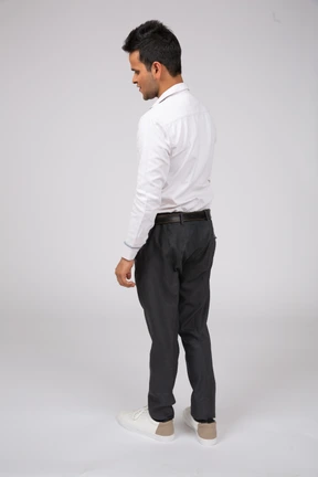 Man in white shirt standing