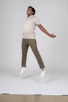 Man in casual clothes jumping