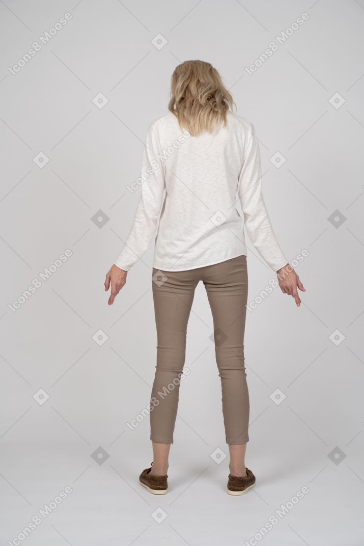 Woman in casual clothes standing