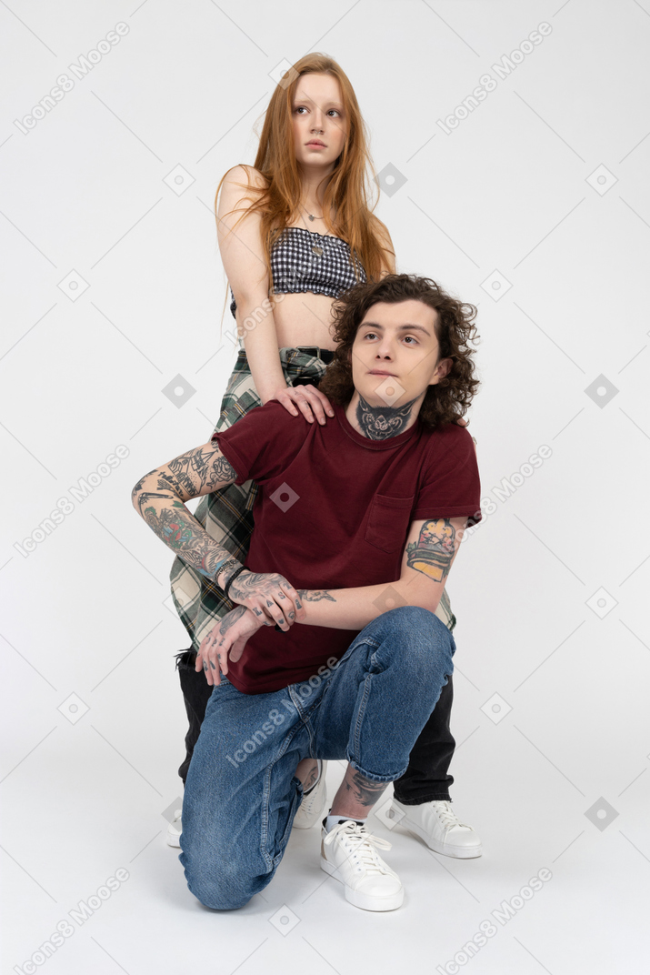 Full length portrait of teenagers posing together