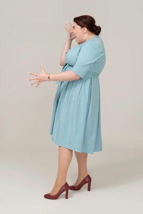 Happy woman in blue dress