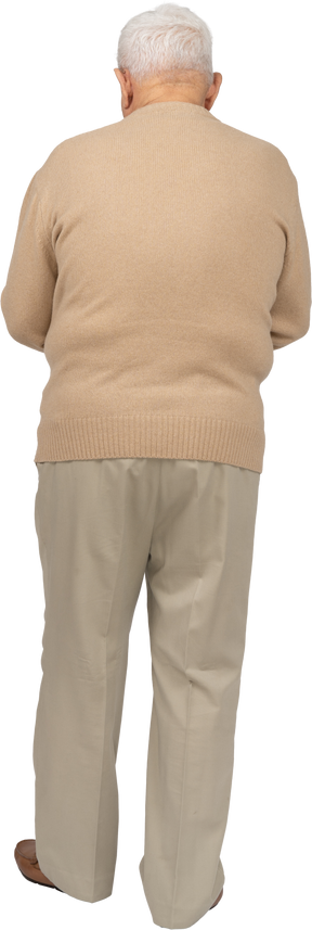 Rear view of an old man in casual clothes